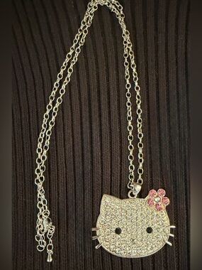 Hello Kitty Silver Crystal Pendant with Pink Flower Accent